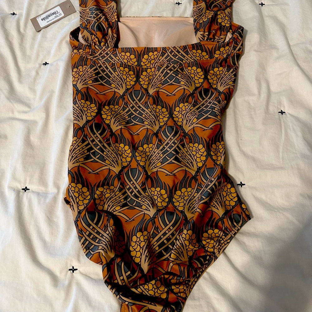 One piece off the shoulder from Albion fit-never worn!